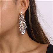 ( White K) brief Metal wind earring  creative hollow feather eaf earrings wind personality arring