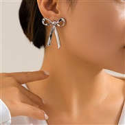 ( White K 3 81)occidental styleowEarring bow ear stud  samll Metal beltins wind Earring woman