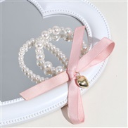 ( Pink)Korea sweet wind bow circle woman temperament all-Purpose Pearl love head rope leather