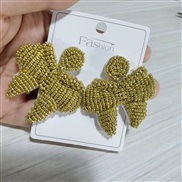 (Ligh  yellow)occidental style handmade weave beads bow Earring personalityins wind high bow earrings